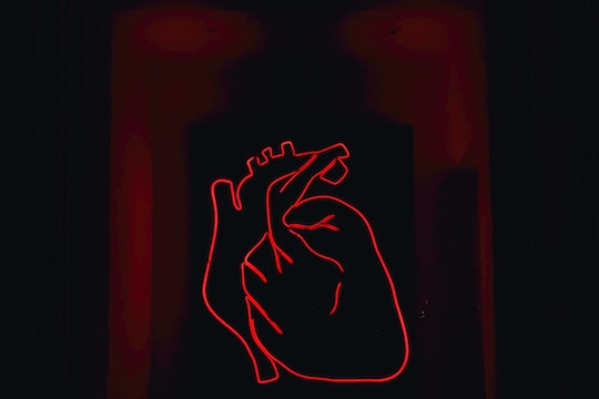 a neon sign outline of the anatomy of the human heart