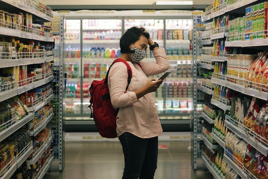 A woman shopping at a grocery store